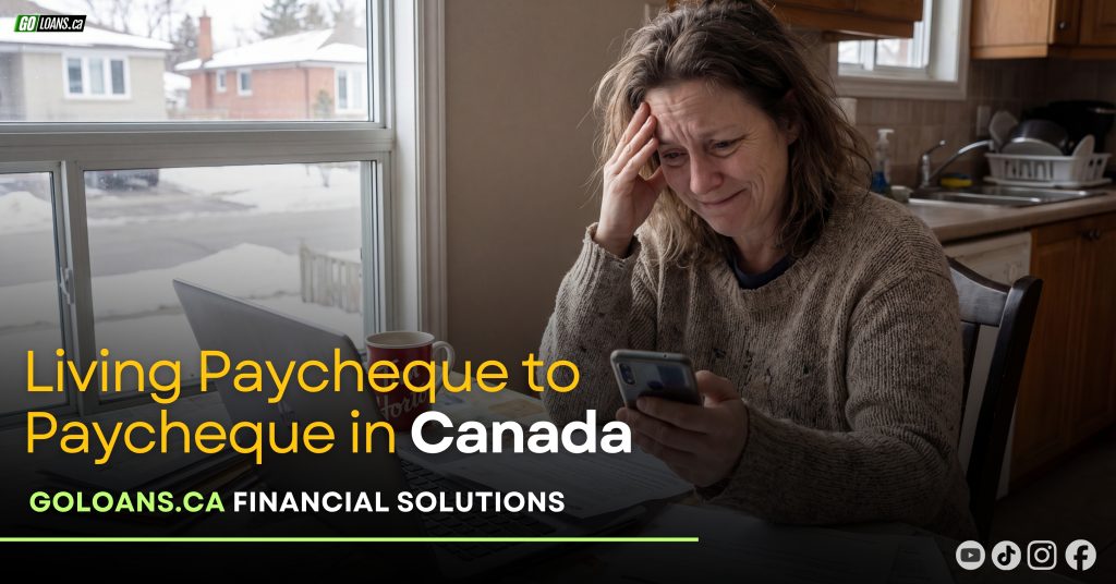 Canadian living paycheque to paycheque looking at bills — GoLoans.ca financial help